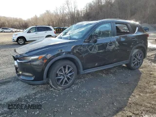 2018 Mazda CX-5 Touring with VIN JM3KFBCM3J0382258, listed as a Copart auction lot 50463005 with 61,887 mi miles and Salvage Title. Bid and sale history available at carsss.com. Image 1.