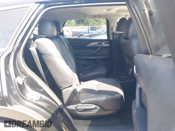 2023 Mazda CX-9 Touring with VIN JM3TCBCY2P0651679, listed as a IAAI auction lot 42002920 with 67,791 mi miles and . Bid and sale history available at DreamBid. Image 8.