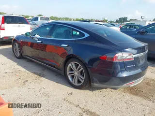 2014 Tesla Model S 60 with VIN 5YJSA1H12EFP39873, listed as a IAAI auction lot 42443414 with 132,773 mi miles and . Bid and sale history available at DreamBid. Image 3.