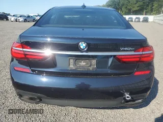 2018 BMW 7 Series 740e xDrive iPerformance with VIN WBA7J2C52JG938439, listed as a Copart auction lot 69452044 with 38,451 mi miles and Salvage Title. Bid and sale history available at carsss.com. Image 6.
