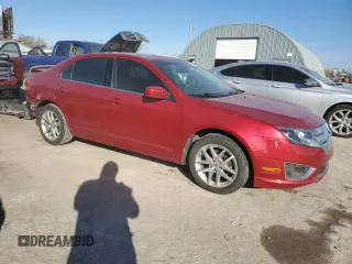 2012 Ford Fusion SEL z VIN 3FAHP0JG8CR435577, wystawiony jako Copart lot #79741724 z przebiegiem 145 023 mil mil oraz Szkoda całkowita • Salvage title. Historia ofert i sprzedaży dostępna na DreamBid. Obrazek 4.
