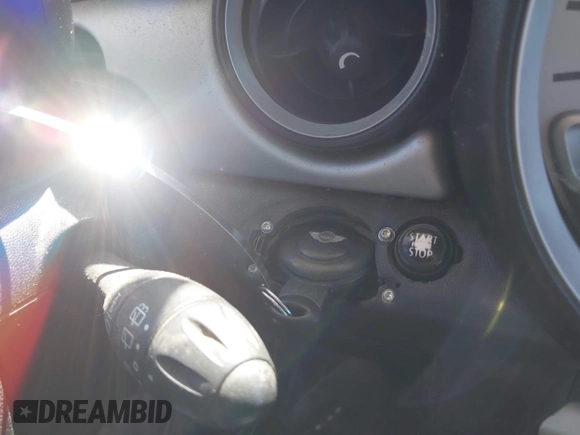 2007 MINI Hardtop with VIN WMWMF33537TU60428, listed as a IAAI auction lot 41753810 with 218,137 mi miles and . Bid and sale history available at DreamBid. Image 11.