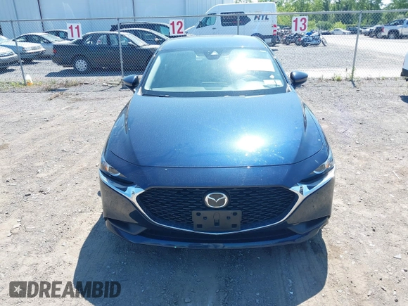 2021 Mazda 3 S with VIN JM1BPAALXM1341814, listed as a IAAI auction lot 42797513 with 32,167 mi miles and . Bid and sale history available at DreamBid. Image 12.