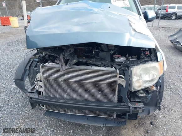 2012 Ford Escape Limited with VIN 1FMCU9EG7CKA88495, listed as a IAAI auction lot 41790560 with 192,892 mi miles. Bid and sale history available at carsss.com. Image 12.