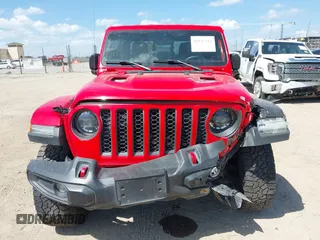 2023 Jeep Gladiator Rubicon z VIN 1C6JJTBG2PL509200, wystawiony jako IAAI lot #42537312 z przebiegiem Nie podano mil oraz . Historia ofert i sprzedaży dostępna na DreamBid. Obrazek 11.