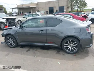 2015 Scion tC with VIN JTKJF5C73FJ008663, listed as a IAAI auction lot 41969395 with 125,758 mi miles. Bid and sale history available at carsss.com. Image 15.