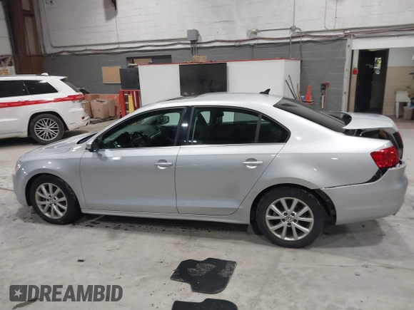 2014 Volkswagen Jetta Sedan SE w/Connectivity/Sunroof PZEV with VIN 3VWD17AJ9EM437804, listed as a IAAI auction lot 42026842 with 83,114 mi miles. Bid and sale history available at carsss.com. Image 14.