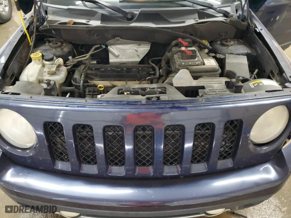 2014 Jeep Patriot High Altitude with VIN 1C4NJPFA3ED660335, listed as a Copart auction lot 48063605 with 127,580 mi miles and Salvage Title. Bid and sale history available at carsss.com. Image 12.