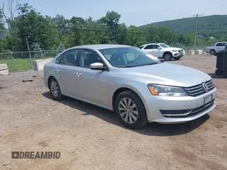 2014 Volkswagen Passat Wolfsburg Edition with VIN 1VWAT7A38EC070085, listed as a IAAI auction lot 42566625 with 180,735 mi miles and . Bid and sale history available at DreamBid. Image 1.