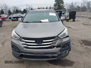 2014 Hyundai Santa Fe z VIN 5XYZTDLB5EG166650, wystawiony jako IAAI lot #41520847 z przebiegiem 197 250 mil mil oraz . Historia ofert i sprzedaży dostępna na DreamBid. Obrazek 11.