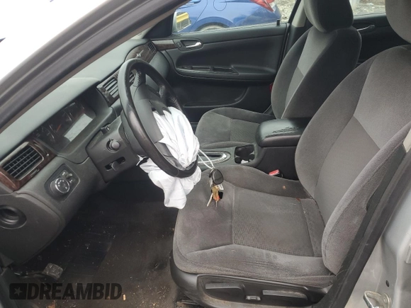 2014 Chevrolet Impala LT with VIN 2G1WB5E38E1177128, listed as a Copart auction lot 43871255 with 145,386 mi miles and Salvage Title. Bid and sale history available at DreamBid. Image 7.