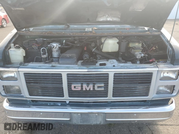 1991 GMC Vandura z VIN 1GDEG25K6M7504729, wystawiony jako Copart lot #71146614 z przebiegiem 181 800 mil mil oraz Tytuł czysty. Historia ofert i sprzedaży dostępna na DreamBid. Obrazek 12.