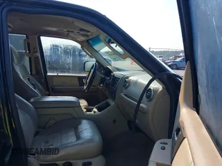 2004 Ford Expedition Eddie Bauer with VIN 1FMPU17L54LA74068, listed as a IAAI auction lot 41974666 with 292,308 mi miles. Bid and sale history available at carsss.com. Image 5.