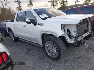 2019 GMC Sierra 1500 Denali z VIN 1GTU9FEL1KZ412357, wystawiony jako IAAI lot #41838994 z przebiegiem 88 967 mil mil oraz . Historia ofert i sprzedaży dostępna na DreamBid. Obrazek 1.