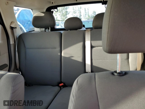 2009 Ford Escape XLS with VIN 1FMCU92749KB94402, listed as a Copart auction lot 60975645 with 171,202 mi miles and Clean title. Bid and sale history available at DreamBid. Image 10.