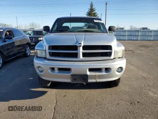 2001 Dodge Ram 2500 with VIN 3B7KF23Z31G821023, listed as a Copart auction lot 82185604 with 77,364 mi miles and Clean Title. Bid and sale history available at carsss.com. Image 5.
