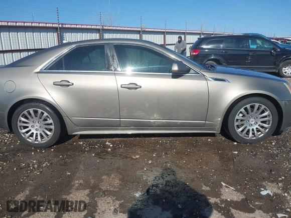 2011 Cadillac CTS Performance with VIN 1G6DK5ED6B0156490, listed as a IAAI auction lot 41346869 with 145,627 mi miles and . Bid and sale history available at DreamBid. Image 13.