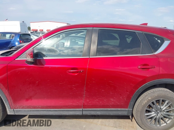 2017 Mazda CX-5 Touring with VIN JM3KFACL3H0195212, listed as a IAAI auction lot 42041361 with 57,377 mi miles and . Bid and sale history available at carsss.com. Image 14.