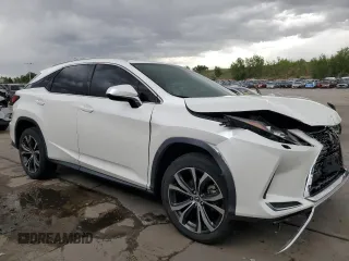 2021 Lexus RX 350 with VIN JTJHZMDA7M2051652, listed as a Copart auction lot 57218985 with 17,013 mi miles and Salvage title. Bid and sale history available at DreamBid. Image 4.