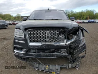 2019 Lincoln Navigator Reserve z VIN 5LMJJ2LT7KEL13810, wystawiony jako Copart lot #54428105 z przebiegiem 112 010 mil mil oraz Szkoda całkowita • Salvage title. Historia ofert i sprzedaży dostępna na DreamBid. Obrazek 5.