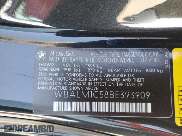 2011 BMW Z4 sDrive35is with VIN WBALM1C58BE393909, listed as a Copart auction lot 89218305 with 112,502 mi miles and Salvage title. Bid and sale history available at DreamBid. Image 14.