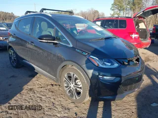 2019 Chevrolet Bolt EV Premier with VIN 1G1FZ6S03K4141861, listed as a IAAI auction lot 41445026 with 51,227 mi miles. Bid and sale history available at carsss.com. Image 1.