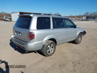 2006 Honda Pilot EX-L with VIN 5FNYF18786B030253, listed as a IAAI auction lot 41708620 with 146,713 mi miles and . Bid and sale history available at DreamBid. Image 4.