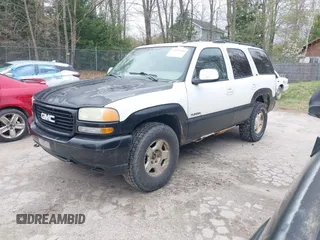 2005 GMC Yukon SLT z VIN 1GKEK13T15J128569, wystawiony jako IAAI lot #42197504 z przebiegiem 242 045 mil mil oraz . Historia ofert i sprzedaży dostępna na DreamBid. Obrazek 2.