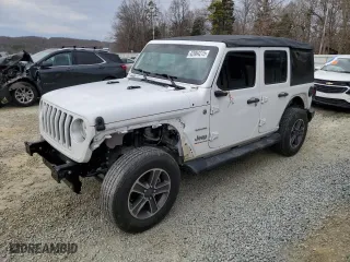 2023 Jeep Wrangler Sahara with VIN 1C4HJXEN1PW598815, listed as a Copart auction lot 42964275 with 29,458 mi miles and Salvage Title. Bid and sale history available at carsss.com. Image 1.