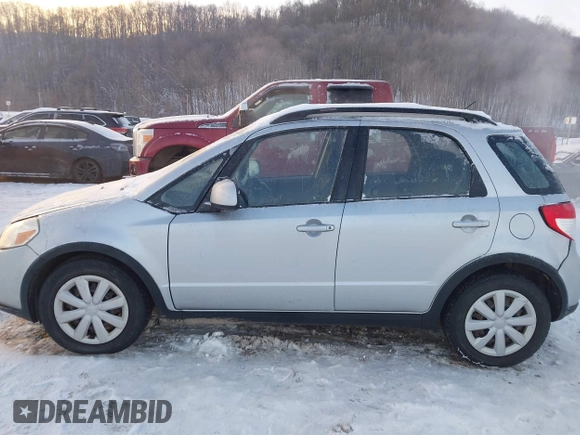 2011 Suzuki SX4 Crossover with VIN JS2YB5A36B6305317, listed as a IAAI auction lot 41333007 with 84,967 mi miles. Bid and sale history available at carsss.com. Image 14.