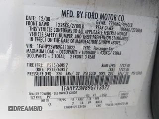 2009 Ford Taurus SE with VIN 1FAHP23W89G113022, listed as a IAAI auction lot 42118187 with 135,319 mi miles. Bid and sale history available at carsss.com. Image 9.