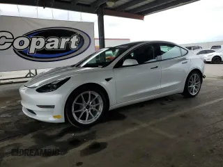2021 Tesla Model 3 Standard Range Plus z VIN 5YJ3E1EA1MF072130, wystawiony jako Copart lot #53911095 z przebiegiem 35 075 mil mil oraz Szkody całkowita. Historia ofert i sprzedaży dostępna na DreamBid. Obrazek 1.
