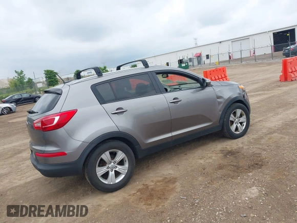 2013 Kia Sportage LX with VIN KNDPBCA29D7495287, listed as a IAAI auction lot 42537122 with 221,052 mi miles and . Bid and sale history available at DreamBid. Image 4.