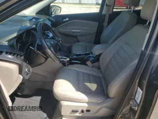 2015 Ford Escape Titanium with VIN 1FMCU9J92FUC74879, listed as a Copart auction lot 54683185 with 143,436 mi miles and Salvage title. Bid and sale history available at DreamBid. Image 7.