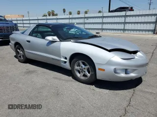 2000 Pontiac Firebird Firebird z VIN 2G2FS22K5Y2116047, wystawiony jako Copart lot #58234695 z przebiegiem 155 876 mil mil oraz Tytuł czysty. Historia ofert i sprzedaży dostępna na DreamBid. Obrazek 4.
