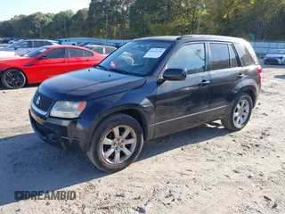 2011 Suzuki Grand Vitara Limited z VIN JS3TE0D72B4100152, wystawiony jako IAAI lot #40676416 z przebiegiem 193 097 mil mil oraz . Historia ofert i sprzedaży dostępna na DreamBid. Obrazek 2.