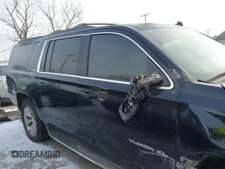 2015 GMC Yukon XL SLT with VIN 1GKS2HKC6FR257133, listed as a IAAI auction lot 41385913 with 150,238 mi miles. Bid and sale history available at carsss.com. Image 13.