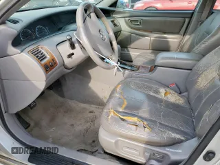 2002 Toyota Avalon XL z VIN 4T1BF28B22U200555, wystawiony jako Copart lot #54544265 z przebiegiem 146 031 mil mil oraz Tytuł czysty. Historia ofert i sprzedaży dostępna na DreamBid. Obrazek 7.