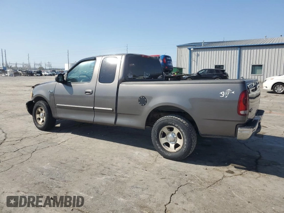 2002 Ford F-150 XL with VIN 1FTRX17222KA58070, listed as a Copart auction lot 52186295 with 0 mi miles and Salvage Title. Bid and sale history available at carsss.com. Image 2.