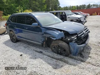 2018 Volkswagen Atlas SEL Premium with VIN 1V2NR2CA1JC572687, listed as a Copart auction lot 55915415 with 75,737 mi miles and Salvage title. Bid and sale history available at DreamBid. Image 4.
