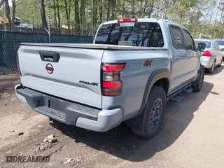 2023 Nissan Frontier PRO-4X with VIN 1N6ED1EKXPN674662, listed as a IAAI auction lot 42001624 with 24,928 mi miles. Bid and sale history available at carsss.com. Image 4.