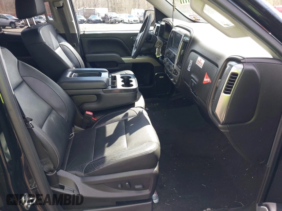 2018 Chevrolet Silverado 1500 with VIN 1GCVKSEC3JZ125571, listed as a IAAI auction lot 41982881 with 58,410 mi miles and . Bid and sale history available at DreamBid. Image 5.