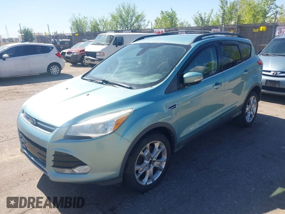 2013 Ford Escape SEL with VIN 1FMCU9HX4DUB95893, listed as a IAAI auction lot 42167435 with 142,016 mi miles. Bid and sale history available at carsss.com. Image 2.