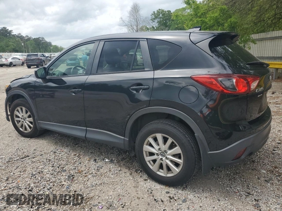 2016 Mazda CX-5 Touring with VIN JM3KE2CY9G0661308, listed as a Copart auction lot 51853485 with 131,595 mi miles and Salvage Title. Bid and sale history available at carsss.com. Image 2.