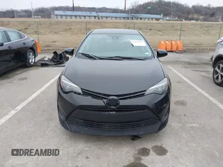 2019 Toyota Corolla L with VIN 5YFBURHE5KP945925, listed as a IAAI auction lot 41493079 with 96,849 mi miles and . Bid and sale history available at carsss.com. Image 13.