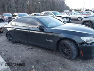 2015 BMW 7 Series 740Li xDrive with VIN WBAYF4C51FGS99074, listed as a IAAI auction lot 41222498 with 132,789 mi miles. Bid and sale history available at carsss.com. Image 13.