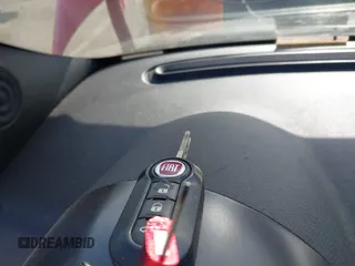 2014 FIAT 500e z VIN 3C3CFFGE3ET245079, wystawiony jako IAAI lot #42099527 z przebiegiem 47 088 mil mil oraz . Historia ofert i sprzedaży dostępna na DreamBid. Obrazek 11.