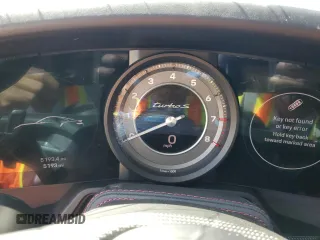 2022 Porsche 911 Turbo S z VIN WP0AD2A91NS255804, wystawiony jako Copart lot #56250395 z przebiegiem 5193 mil mil oraz Szkody całkowita. Historia ofert i sprzedaży dostępna na DreamBid. Obrazek 9.