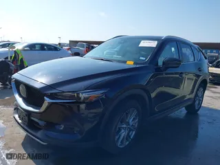 2020 Mazda CX-5 Grand Touring with VIN JM3KFADM9L0760353, listed as a IAAI auction lot 41520153 with 67,800 mi miles. Bid and sale history available at carsss.com. Image 19.