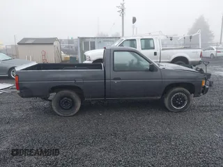 1997 Nissan Frontier XE with VIN 1N6SD11S7VC319806, listed as a IAAI auction lot 41349741 with 215,812 mi miles and . Bid and sale history available at DreamBid. Image 14.